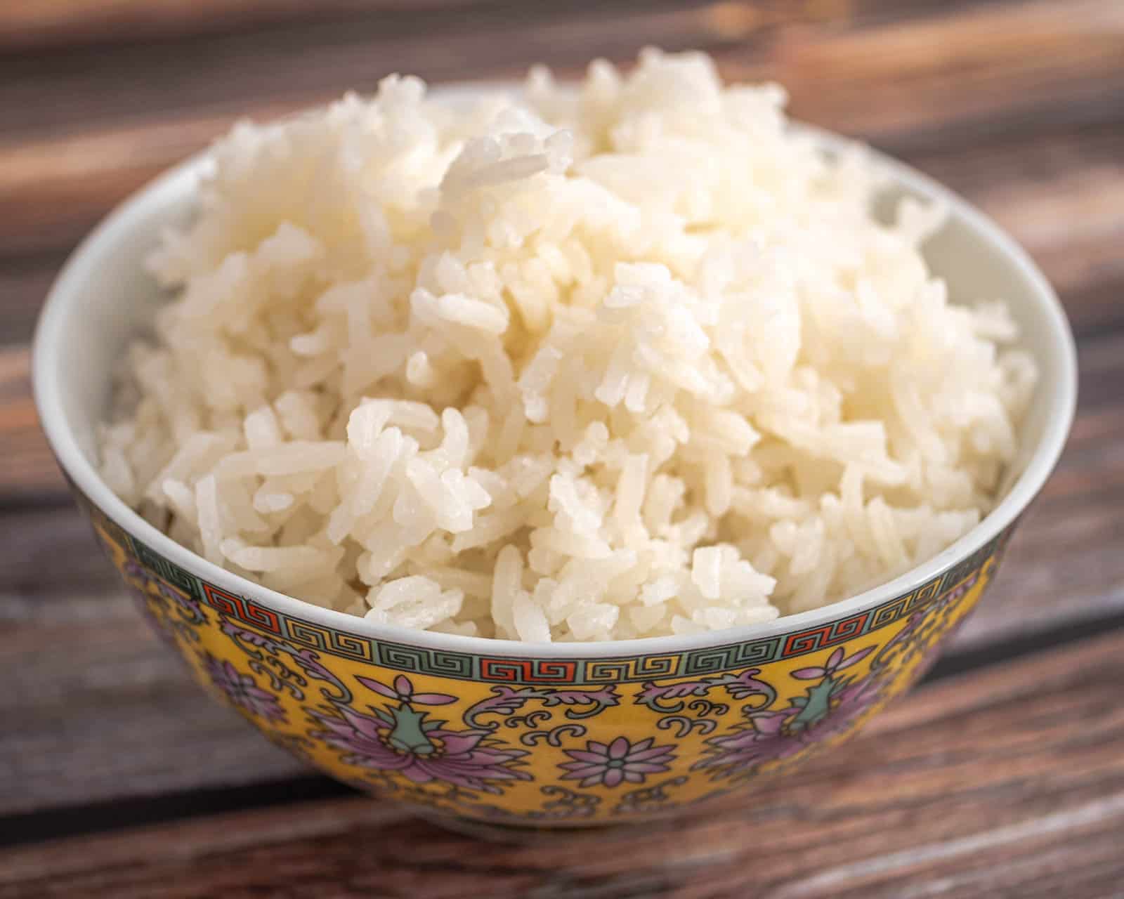 Bowl of plain white rice with celiac-safe checkmark